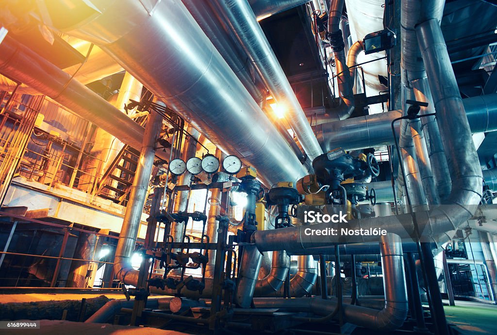 Industrial zone, Steel pipelines, valves and gauges Industry Stock Photo