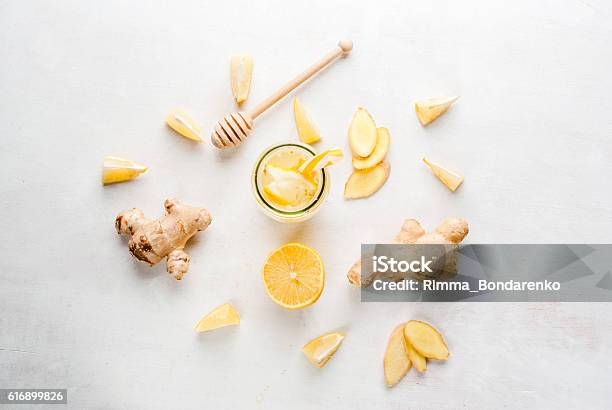 Gingerlemon Drink In A Bottle With A Straw Stock Photo - Download Image Now - Ginger - Spice, Tea - Hot Drink, Lemon - Fruit