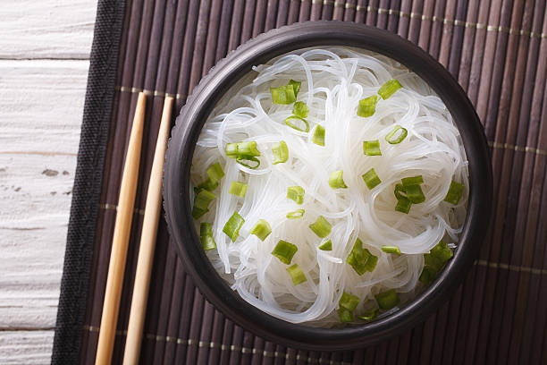 asian crystal noodles closeup in a bowl. horizontal top view - crystal noodles imagens e fotografias de stock