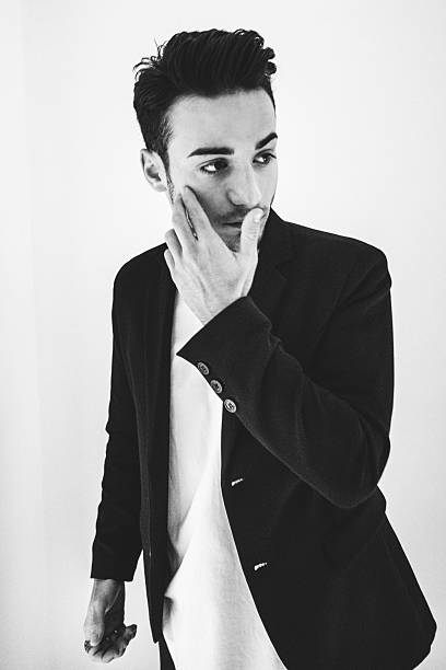 istock Serious fashion man portrait 616903662