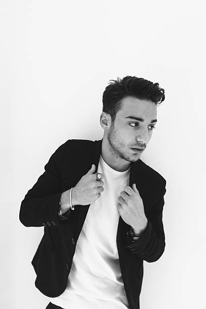 istock Serious fashion man portrait 616904176