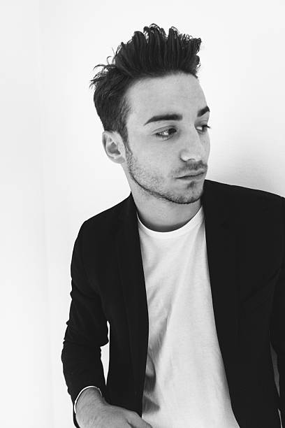 istock Serious fashion man portrait 616904354