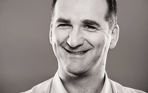 istock Smiling, confident, positive, cheerful man - close-up portrait 616905616