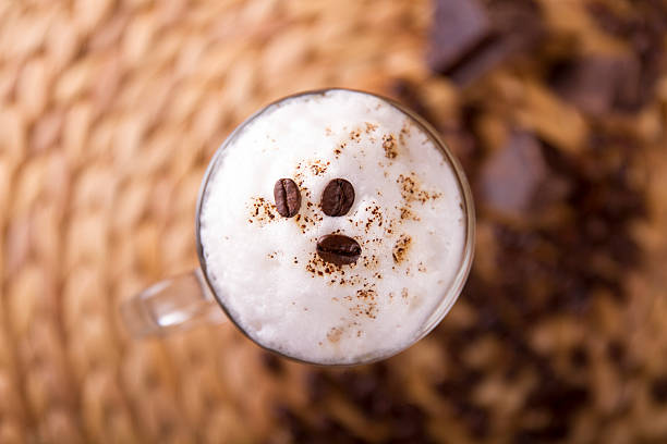 istock Irish cream coffee decorated with coffee beans on the table 616905838