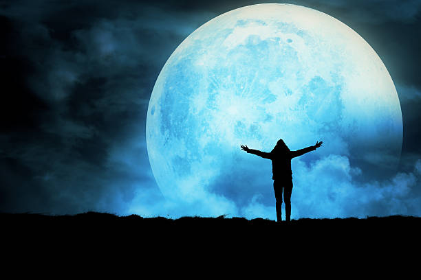 istock Girl enjoying the night sky. 616905870