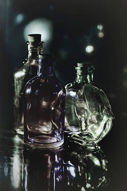 istock Magic love witch brew potion colorful glasses bottles 616907470