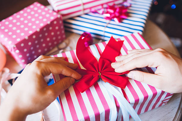 istock Gift Wrapping Surprise Holiday Christmas Concept 616907684