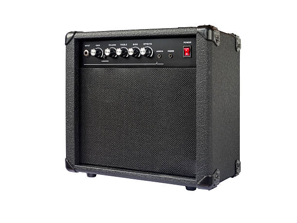 Small guitar amplifier isolated on white background Small guitar amplifier isolated on white background amplifier photos stock pictures, royalty-free photos & images