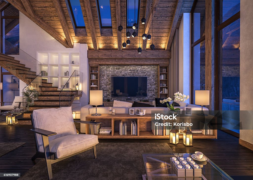 3D rendering of evening living room of chalet 3D rendering of cozy living room on cold winter night in the mountains, evening interior of chalet decorated with candles, fireplace fills the room with warmth. Luxury Stock Photo