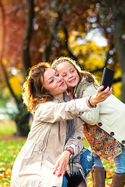 istock Happy family taking selfie 616908308