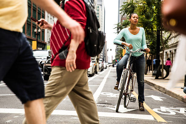 istock Woman cycling in Chicago 616908760