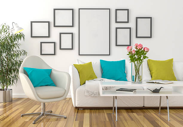 istock Living room - on the wall empty picture frames 617352926