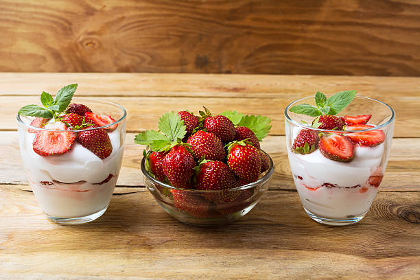istock Layered diet dessert with yogurt, strawberry and ripe berries 617353298