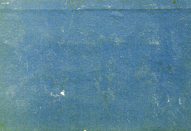 istock Blue color scratched paper texture. 617354594