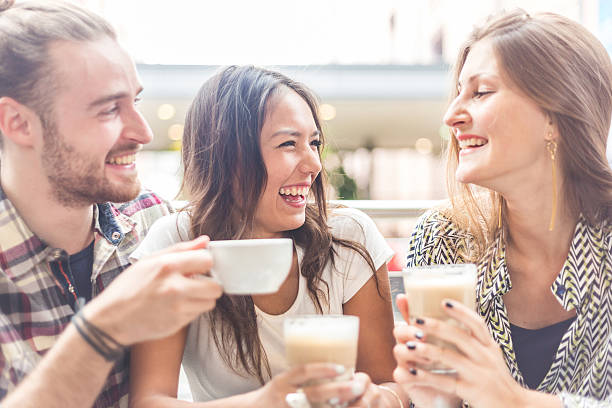 istock Multiracial group of friends having a coffee together 617356002