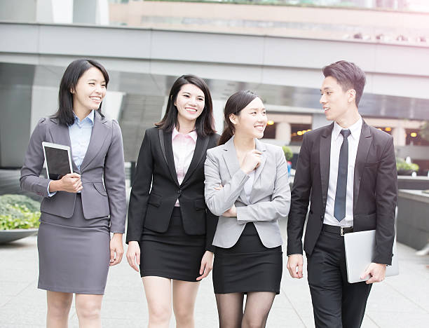 istock businesspeople talk in office 617356152