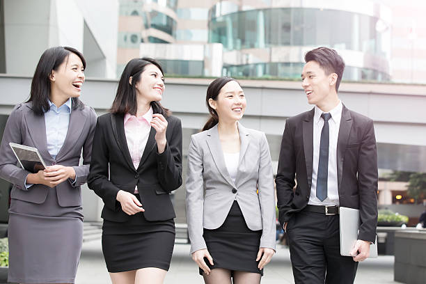 istock businesspeople talk in office 617356252