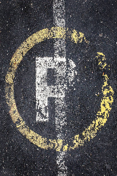 istock Parking Sign Painted On An Asphalt 617356266