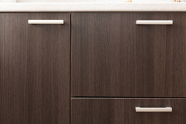 istock Wooden wardrobe drawer front, metal handle 617357470