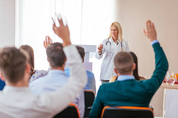 istock Professor of medicine science with students 617358414