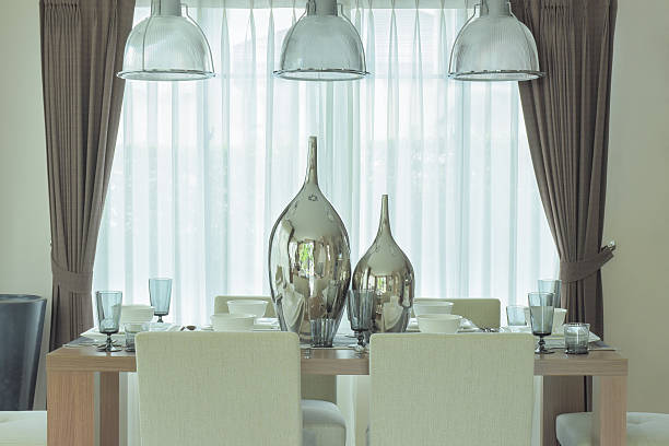 istock Decorative silver jars on dining table in modern classic decoration 617359108