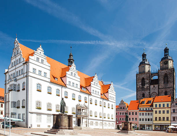 istock Market square in Wittenberg Monument of Martin Luther 617360856