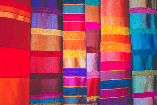 Beautiful srtiped multi colored Moroccan Fabric hanging at a street market in Marrakesh, Morocco, Northern Africa. Nokon D800, full frame, XXXL.
