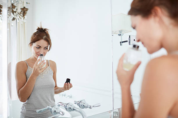 Woman relaxing a luxury bathroom.