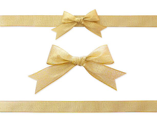 golden ribbon isolated on white golden ribbon isolated on white tied knot photos stock pictures, royalty-free photos & images