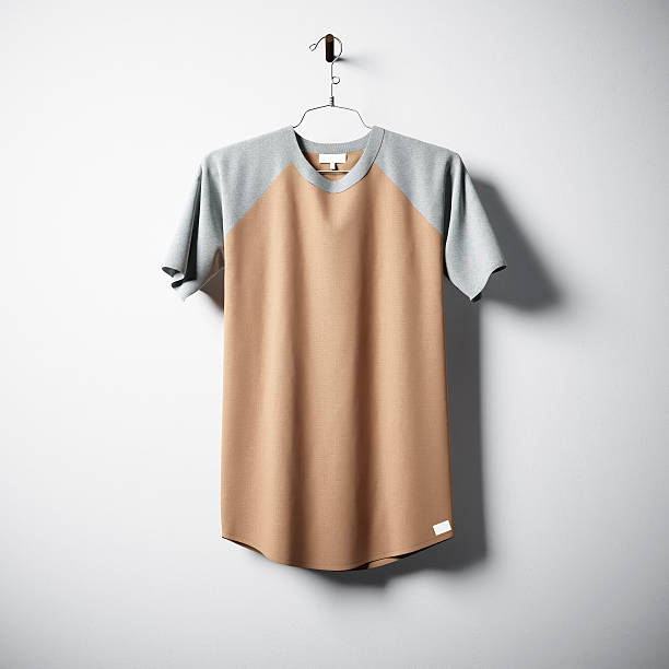 istock Blank multicolor cotton tshirt hanging in center of empty concrete 617365662