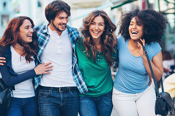 istock Cheerful group on the street 617366952