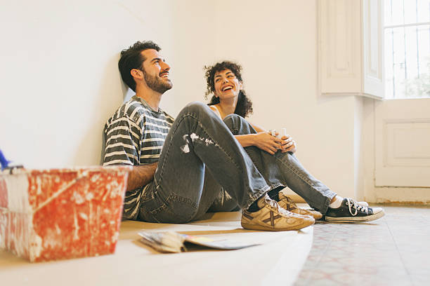 istock Coffee break during a painting project in new apartment. 617368450