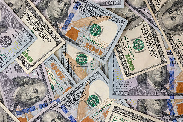 istock Heap of dollars as texture 617370756