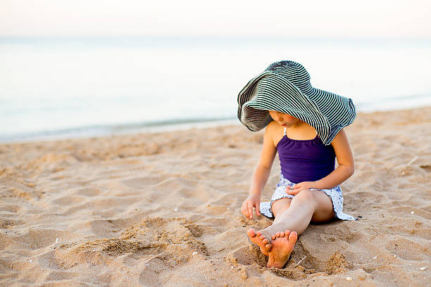 istock Little girl on the seashore 617371494