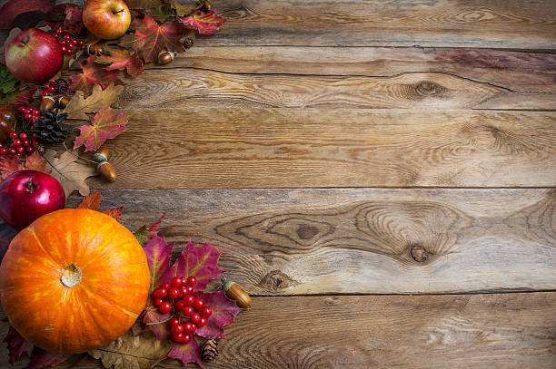 istock Thanksgiving  or fall greeting background with orange pumpkins a 617371576