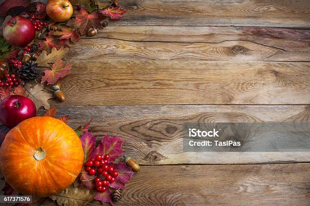 Thanksgiving Or Fall Greeting Background With Orange Pumpkins A Stock Photo - Download Image Now