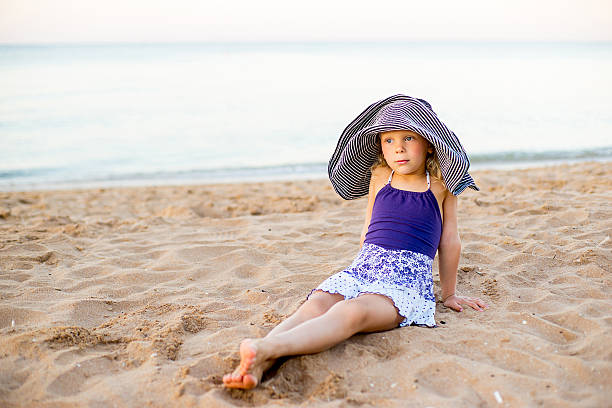 istock Little girl on the seashore 617371684