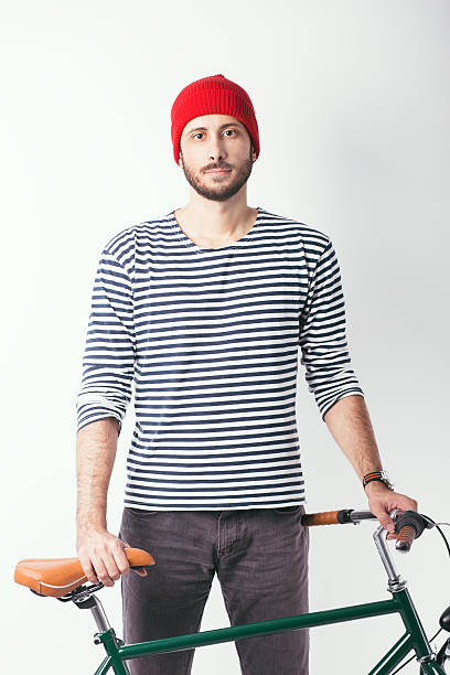 Bearded guy with his bicycle.