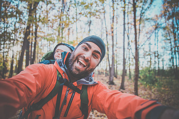 istock Father Backpacking Hiking with Baby in Forest 617374848