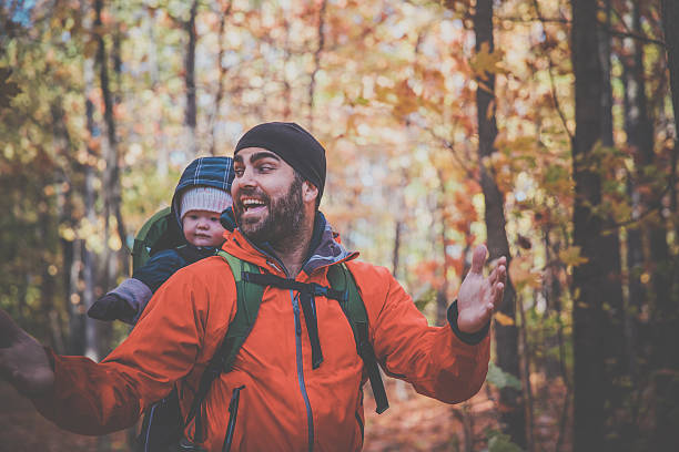 istock Father Backpacking Hiking with Baby in Forest 617374886