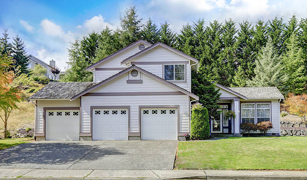 istock Luxury house exterior with three garage spaces 617375816