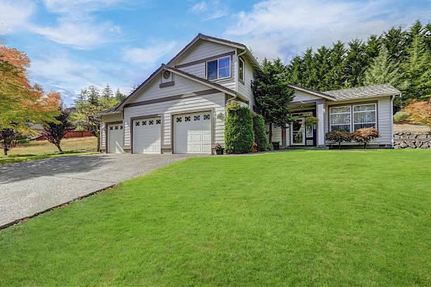 istock Luxury house exterior with three garage spaces 617375900