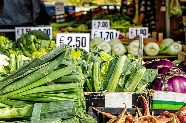 istock vegetables in a street market 617376390