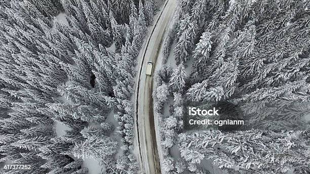 Snowy Winter Road With A Car Stock Photo - Download Image Now - Snow, Car, Cold Temperature