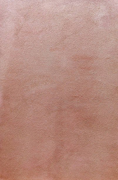 istock Background texture of a matt structure with a warm tint. 617377262