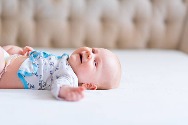 istock happy smiling baby looking at camera 617378306