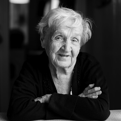 Portrait of an elderly woman. Black-and-white photo.