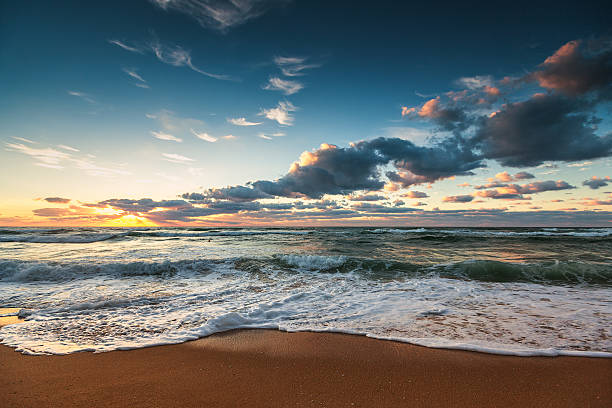 istock Beautiful sunrise over the sea 617385556