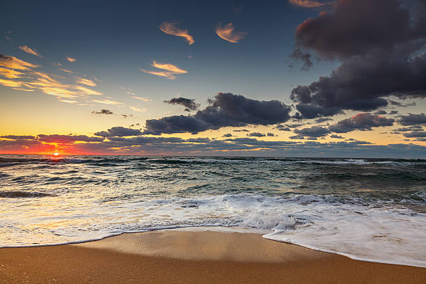 istock Beautiful sunrise over the sea 617385796
