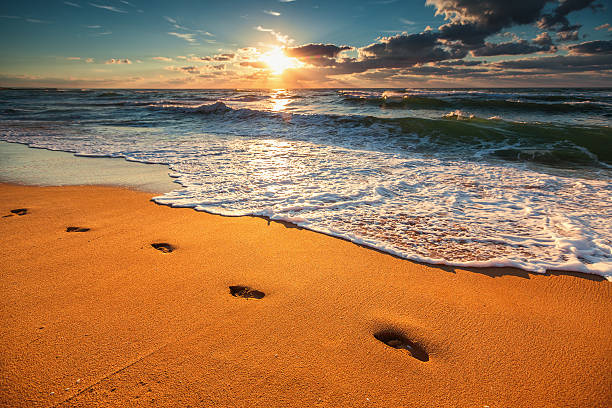 istock Beautiful sunrise over the sea 617386256